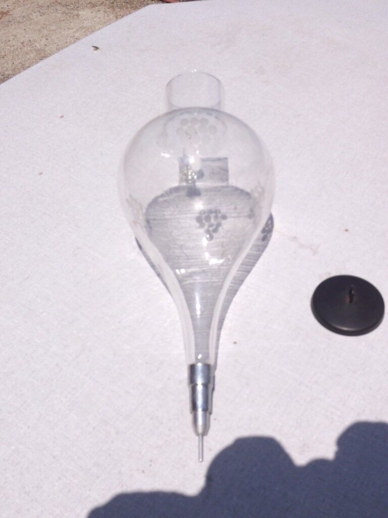 Iron and glass wine decanter