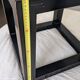 Chinese side tables in black lacquer, stone top.