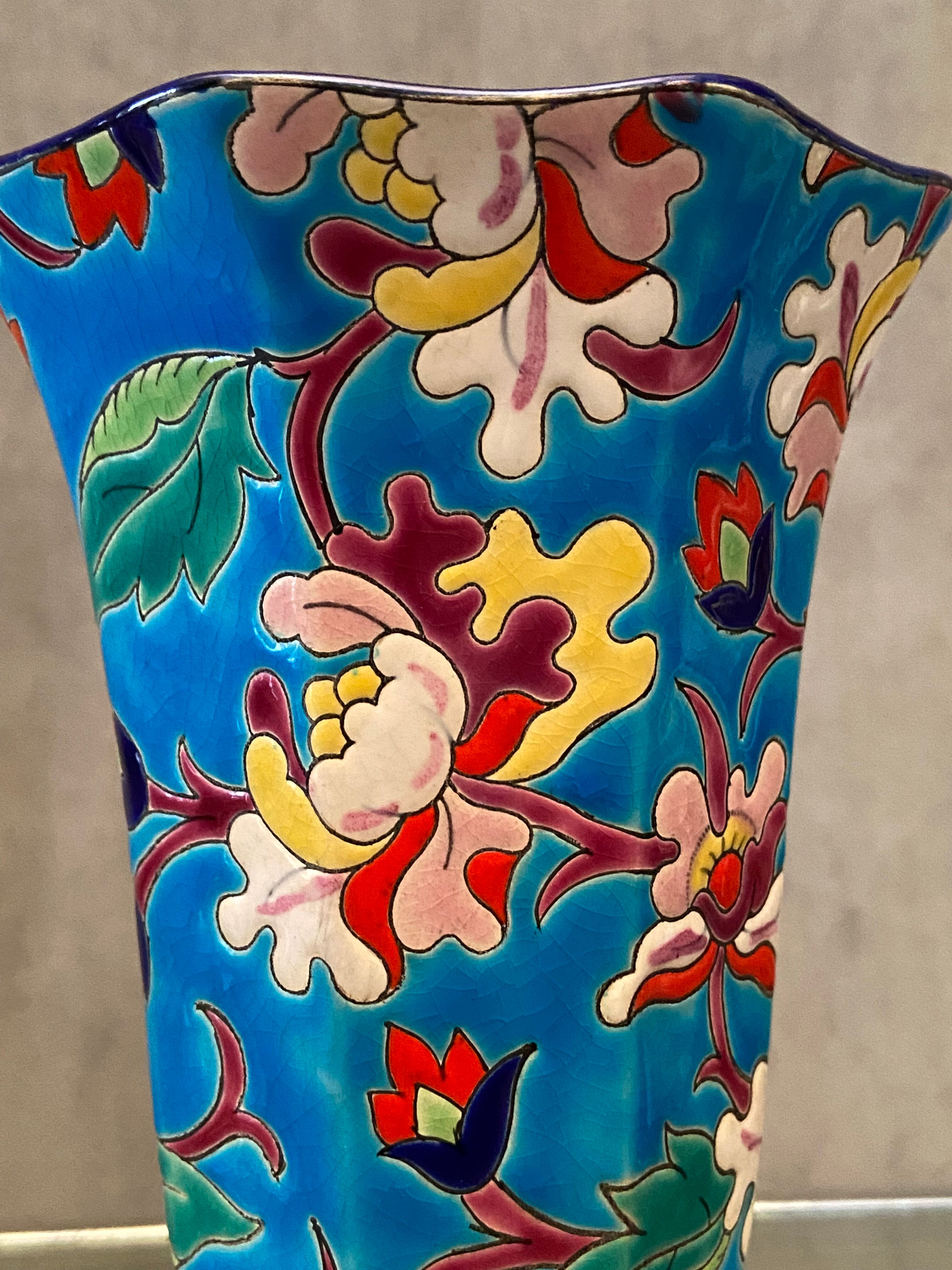 Faience cornet vase with floral decoration signed Emaux de Longwy