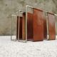 Minimalist metal and camel leather magazine holder