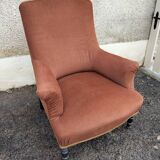 Antique brown velvet tub chair – turned legs and brass rings.