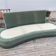 Rounded sofa with fringes