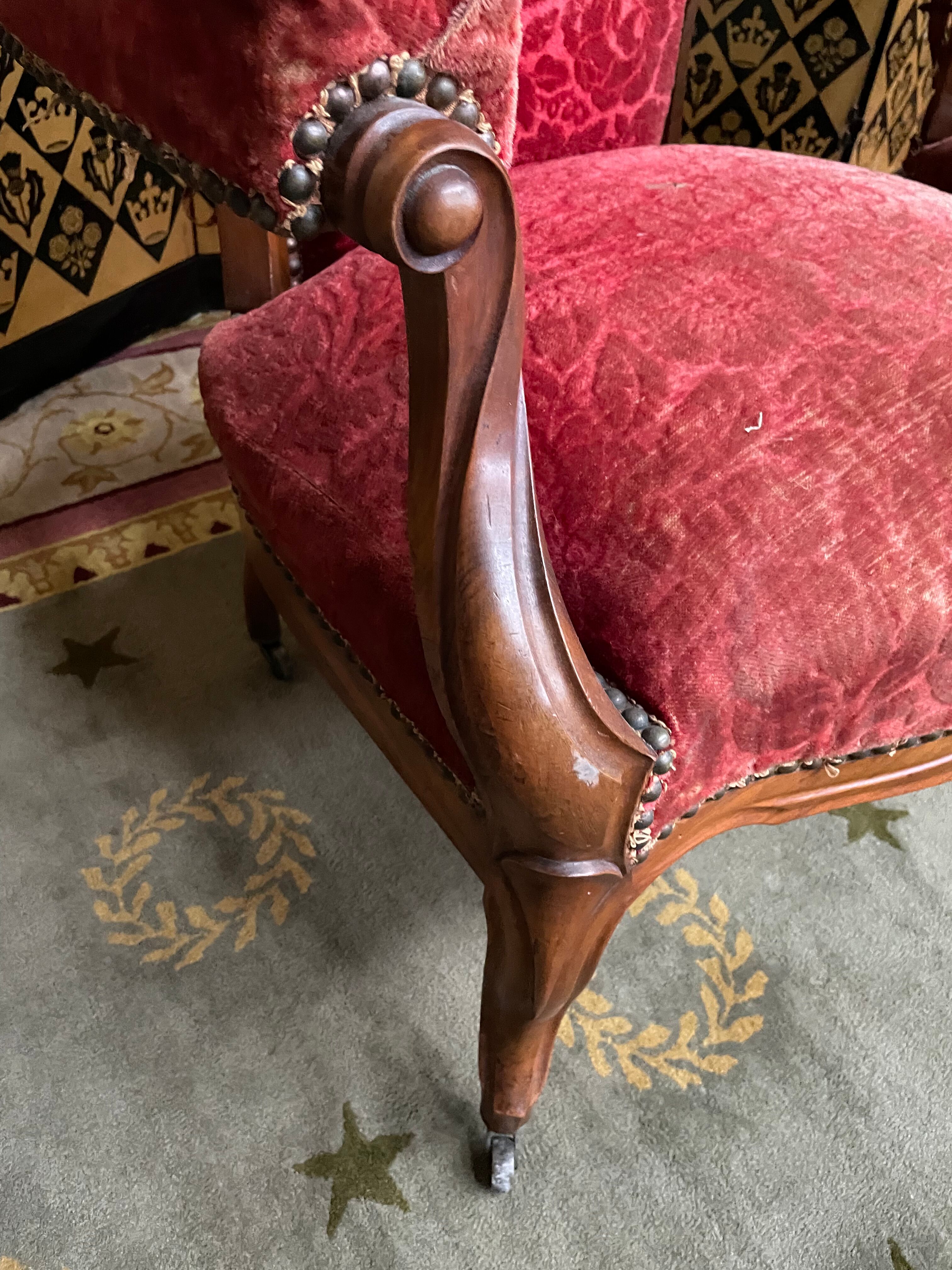 Pair of Louis Philippe period armchairs with rack and pinion