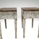Pair of Louis XVI style bedside tables with patina