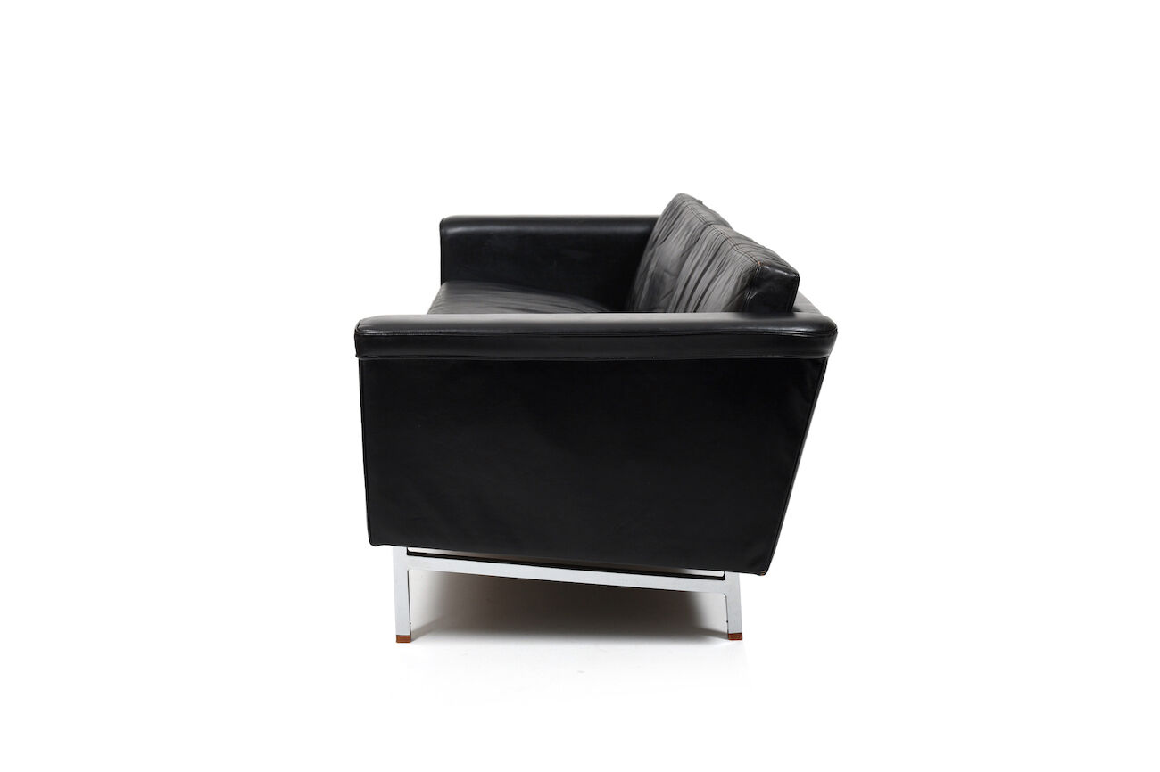 Danish leather sofa with chrome legs and teak ends