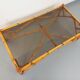 Vintage rectangular coffee table in rattan and smoked glass from the 1970s.