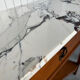 Large console in Calacatta Viola marble & solid cherry wood.