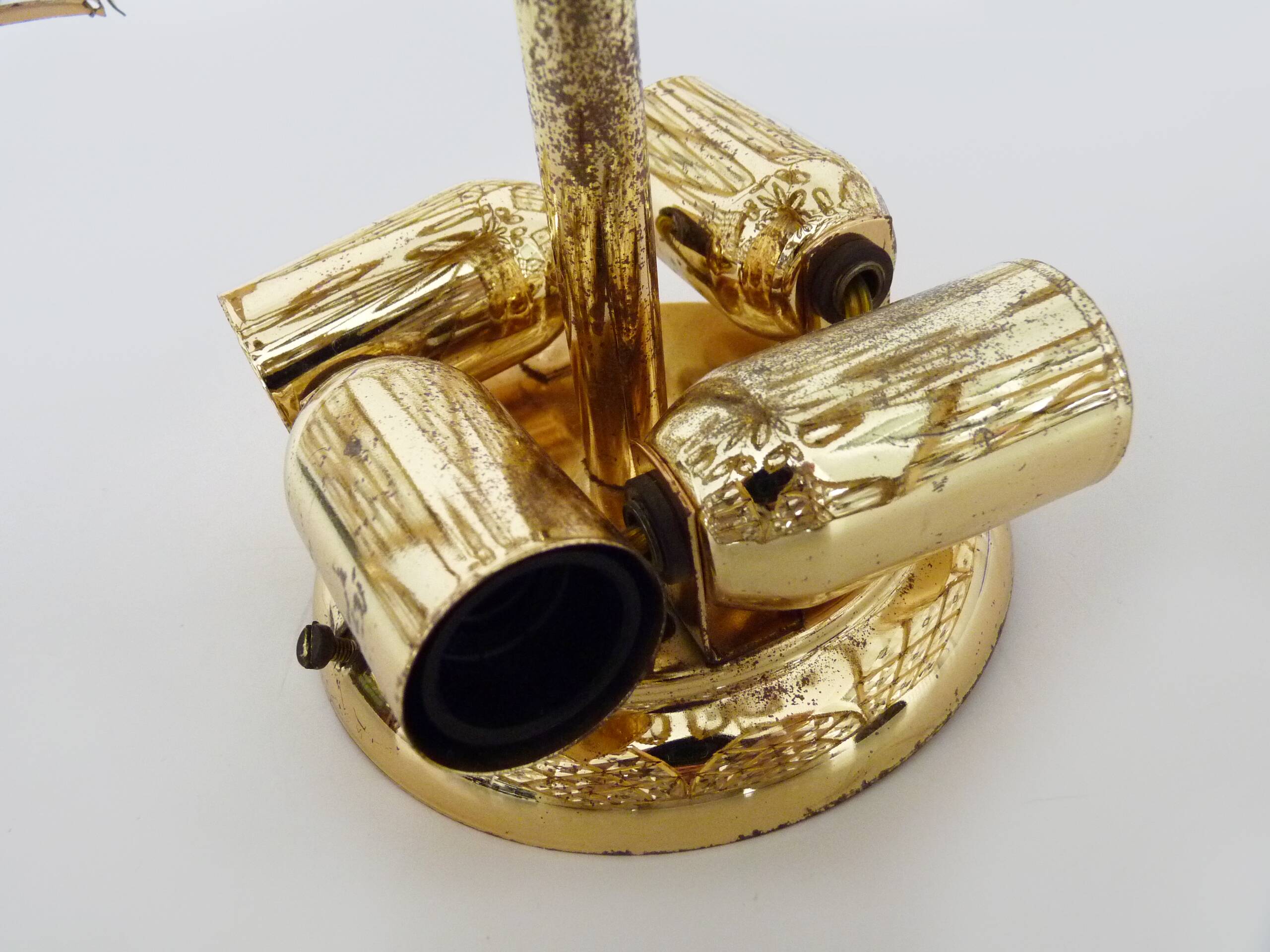 Ancien plafonnier en forme d'étoile à 4 feux en laiton, pampilles en verre. Années 80