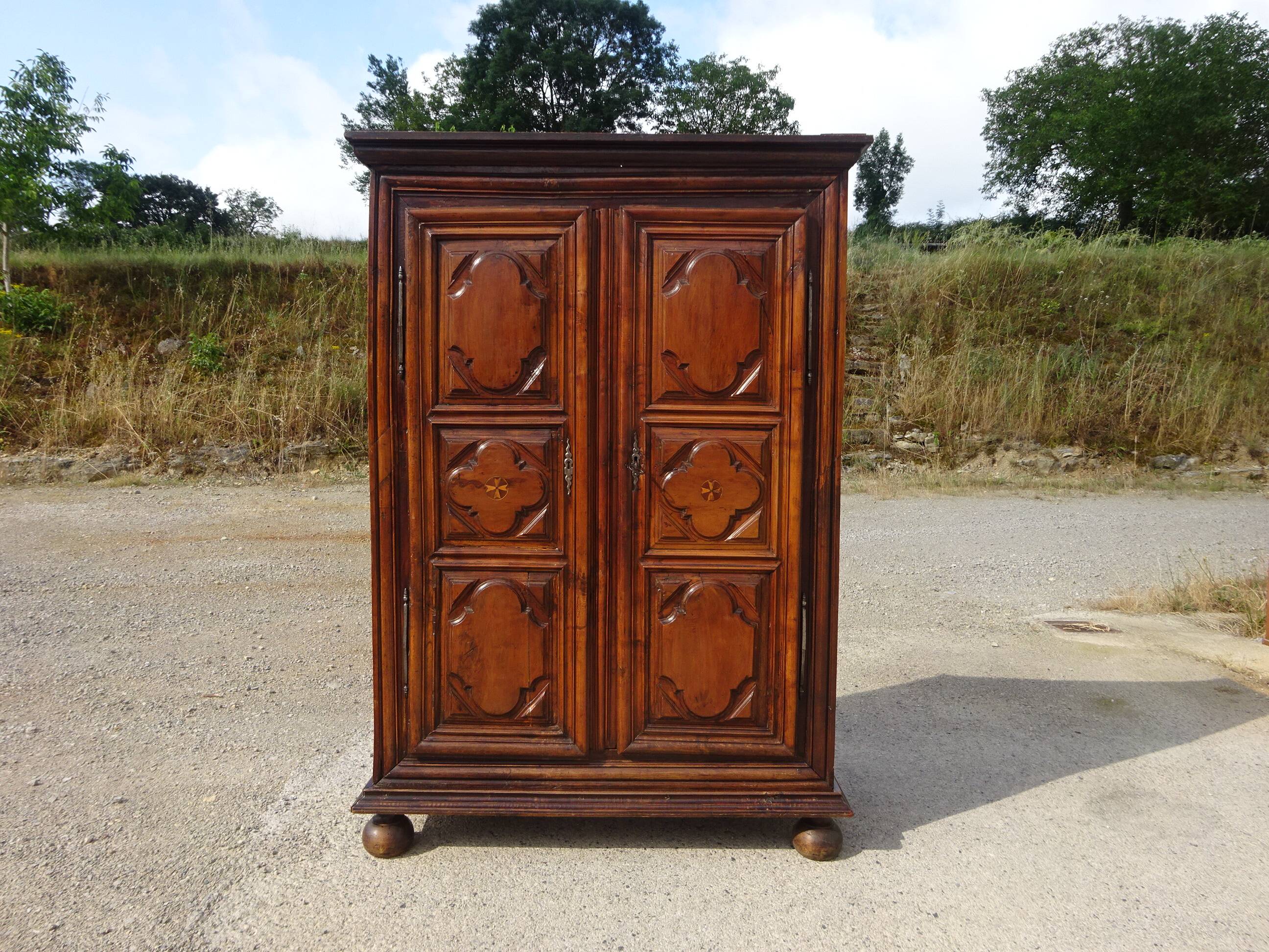 Antique Louis XIII wardrobe in solid walnut
