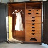 Old black wardrobe - wooden drawers and labels of origin