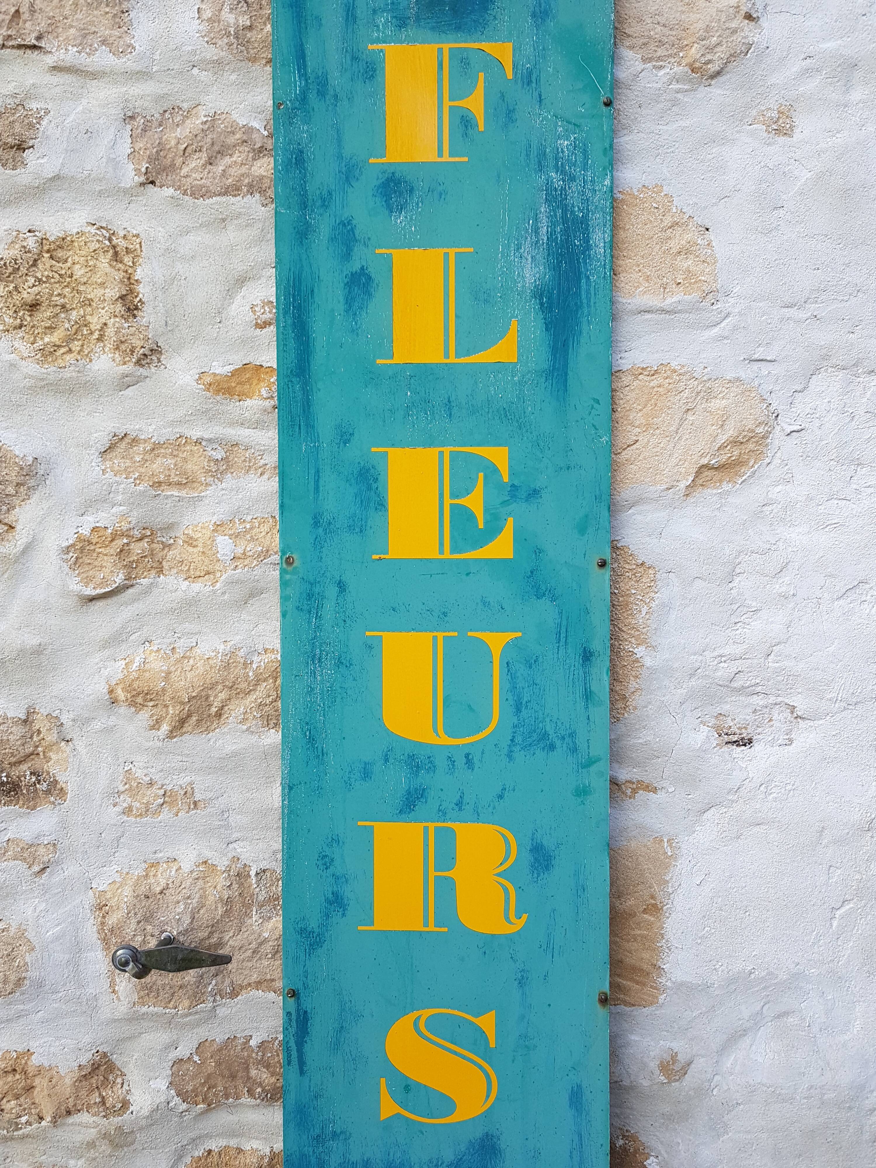 Former painted plate sign of florist