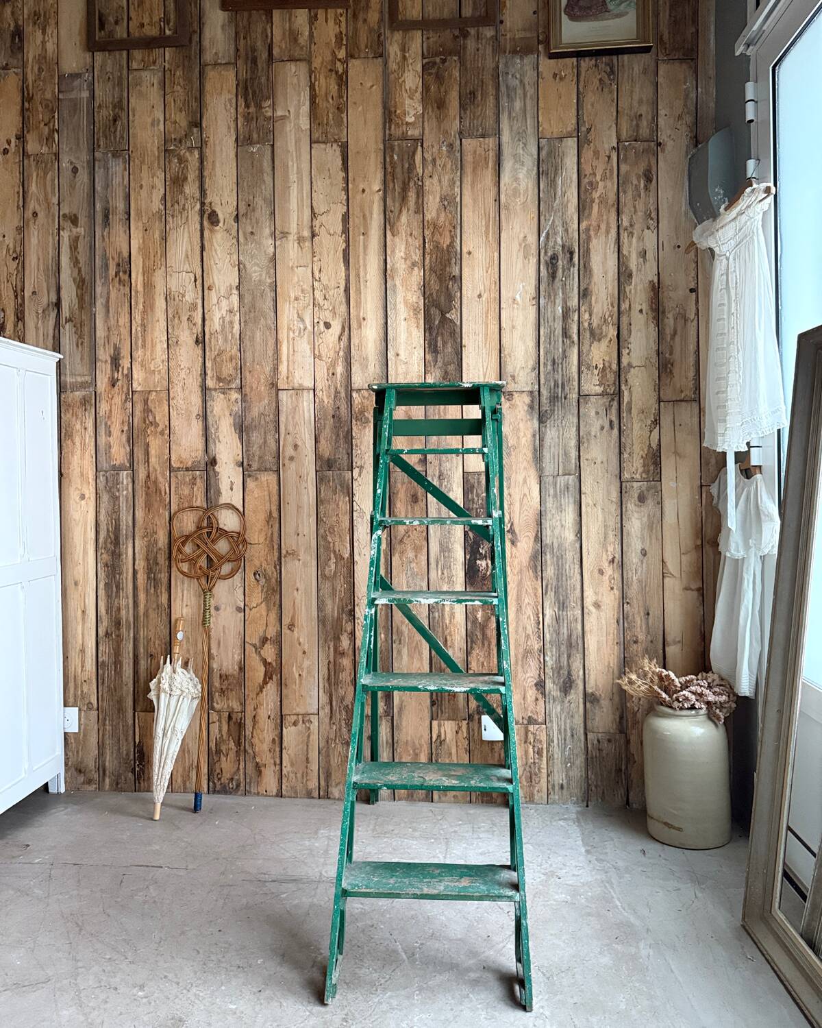 Vintage stepladder with green patina