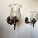 Pair of wall sconces in bronze with opaline glass tulips.