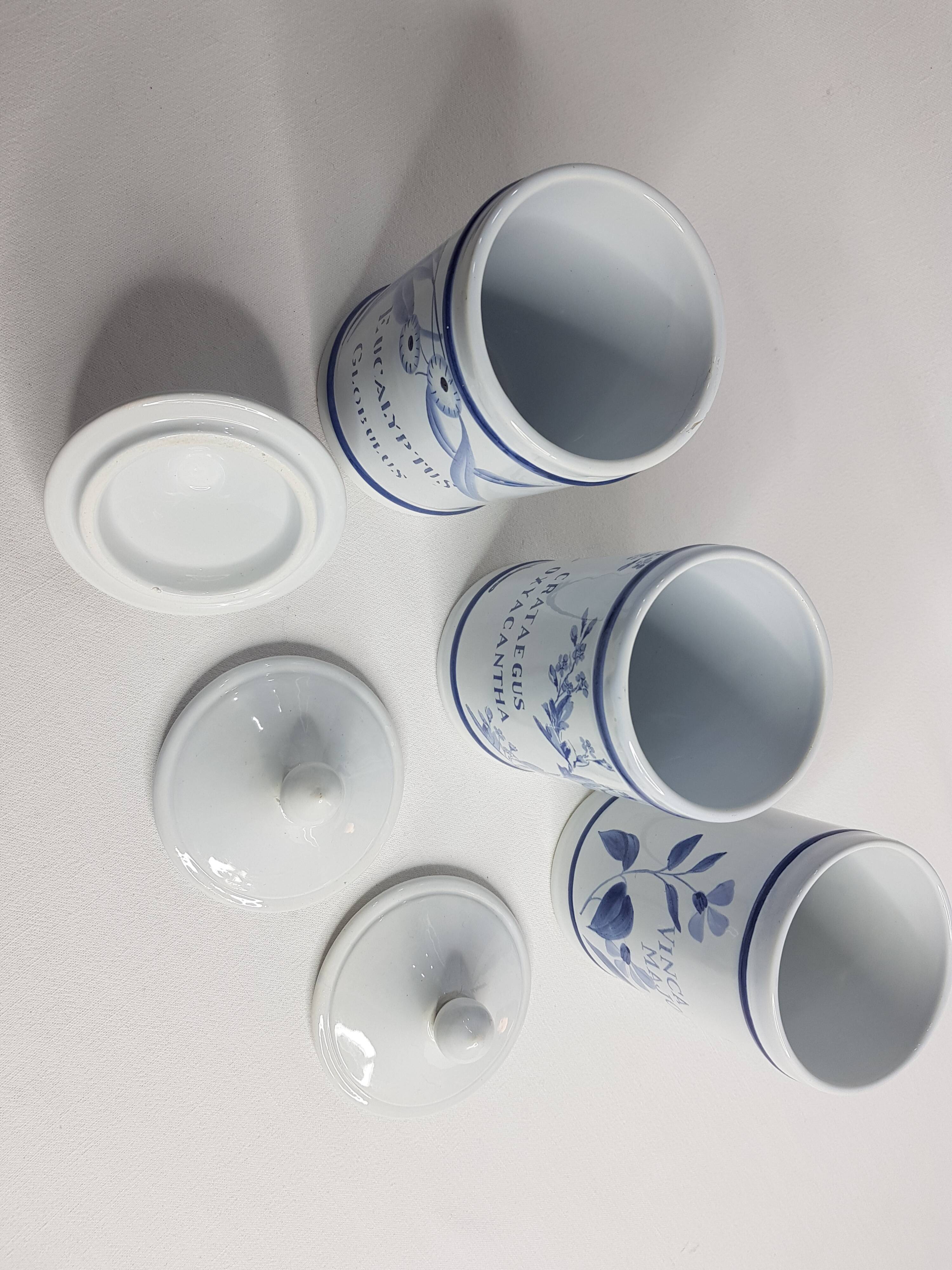 Set of three longchamp earthenware pharmacy jars