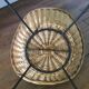 Antique round rattan armchair