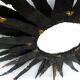 Large brutalist sun mirror in patinated metal with gold accents, 1970.