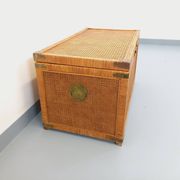 Vintage trunk in wood, rattan, caning, and brass.