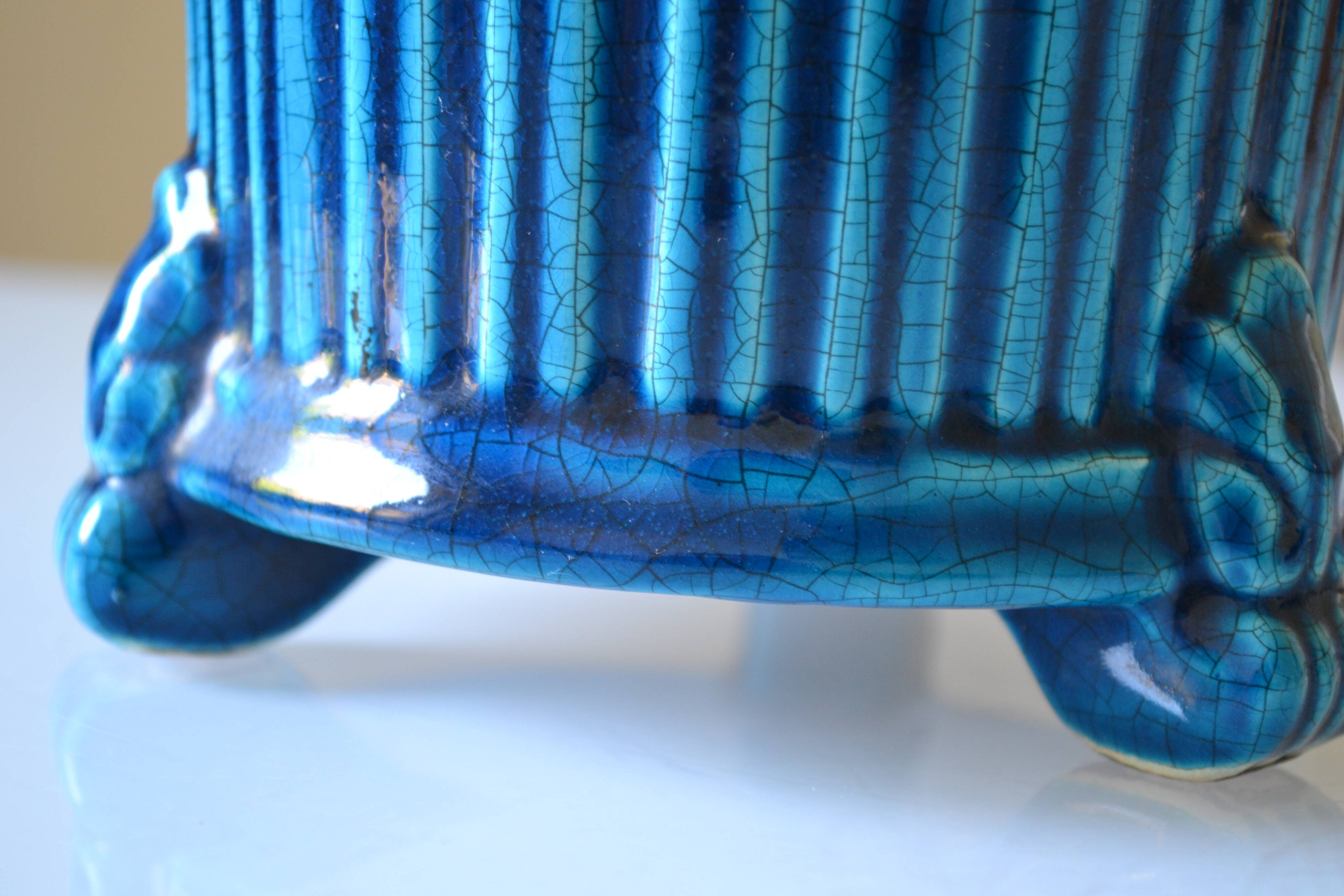 Cracked blue ceramic cache pot