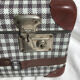 Suitcase cardboard tiles corners brown red