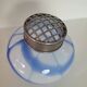 Old white and blue glass flower vase