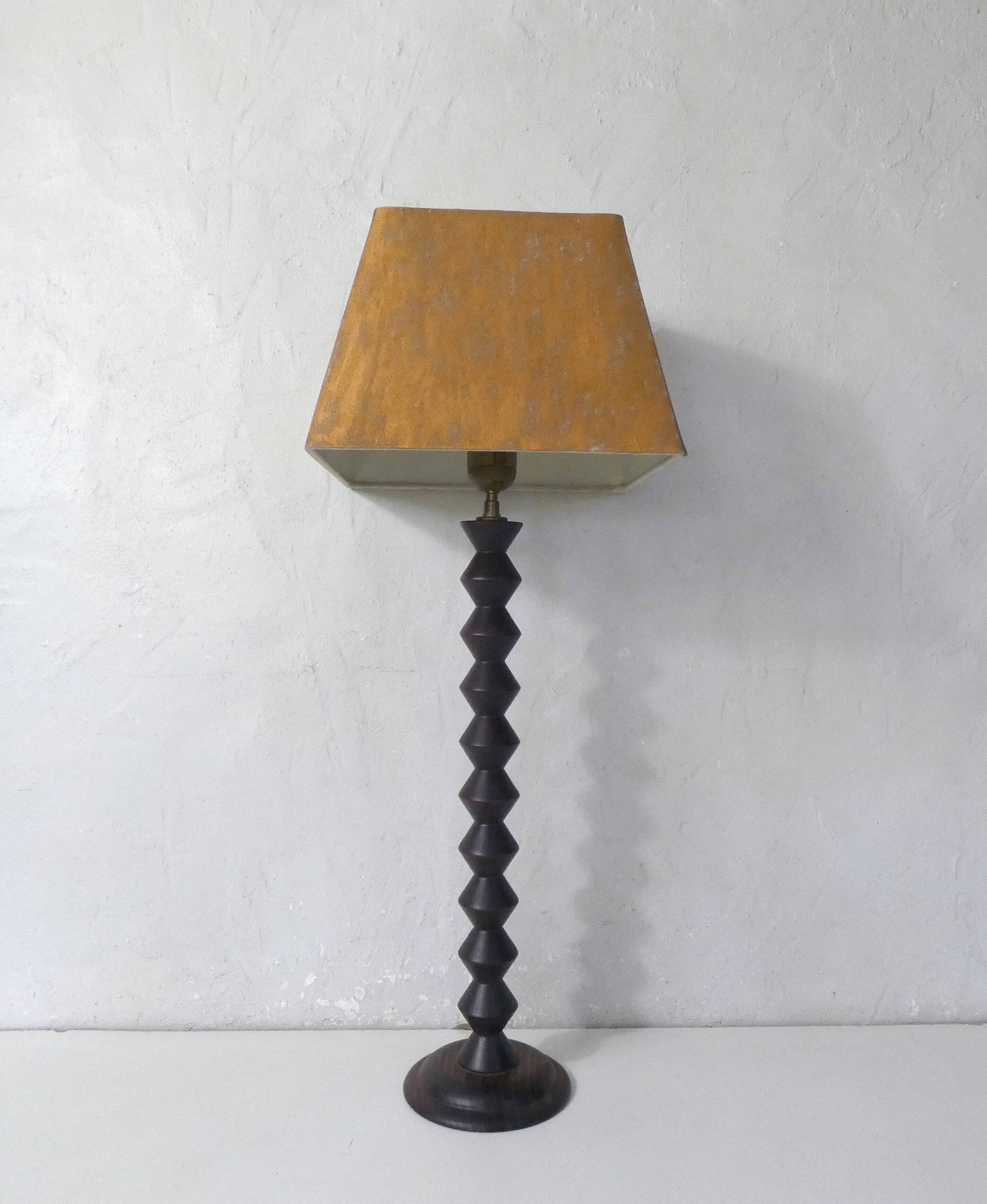 turned wooden lamp with spool base and vintage copper shade