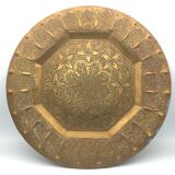 Oriental brass tray with chiseled decoration of arabesques and flowers