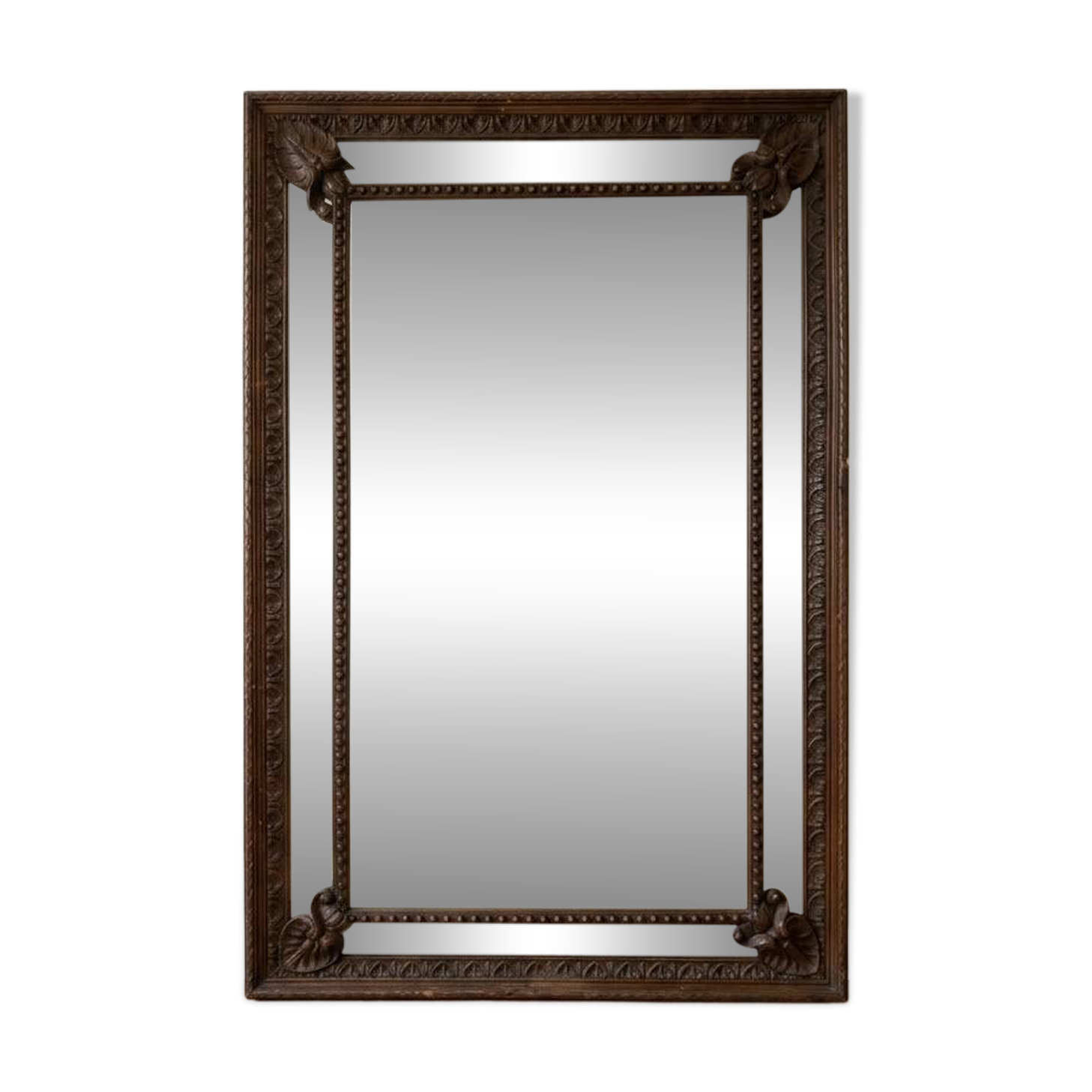 Large antique mirror in carved wood