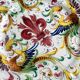 Decorative wall plate in hand-painted earthenware
