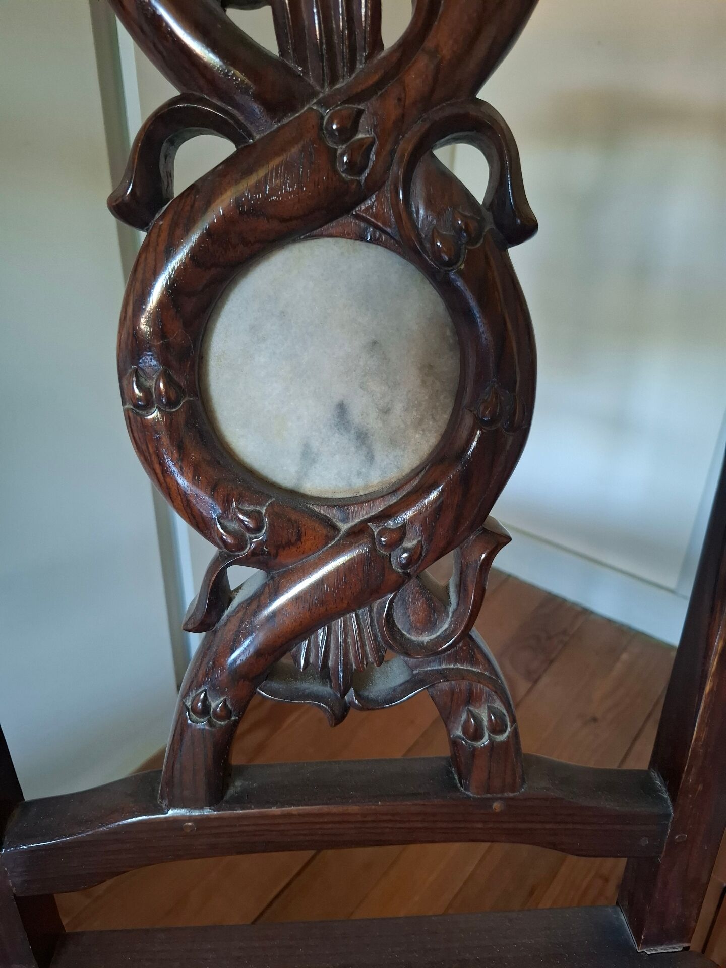 Sculpted chairs in solid wood