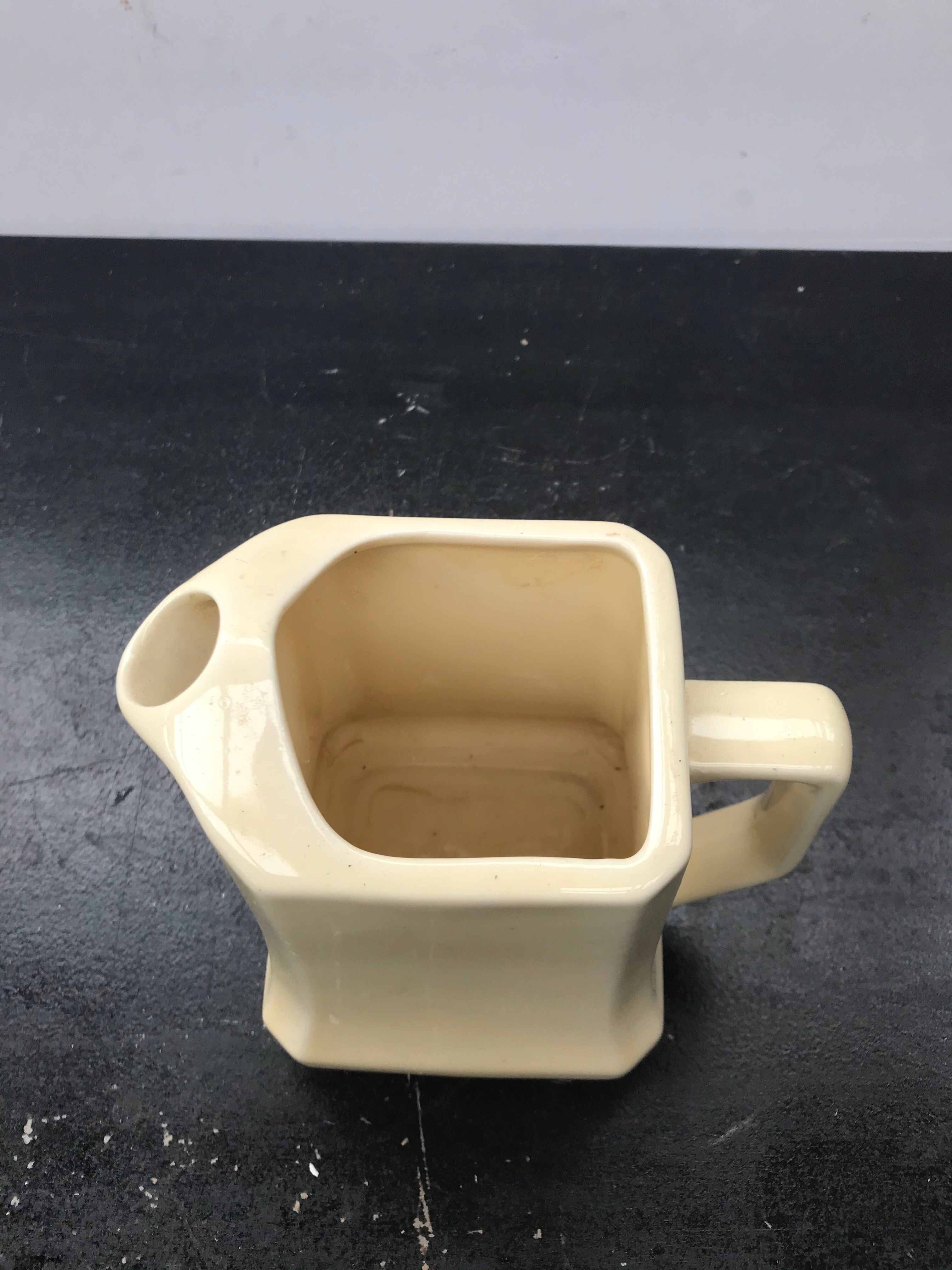 Former beige ceramic pitcher 70