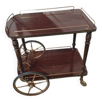 Vintage bar trolley on wheels from the 1960s in gold metal and brown formica wood,