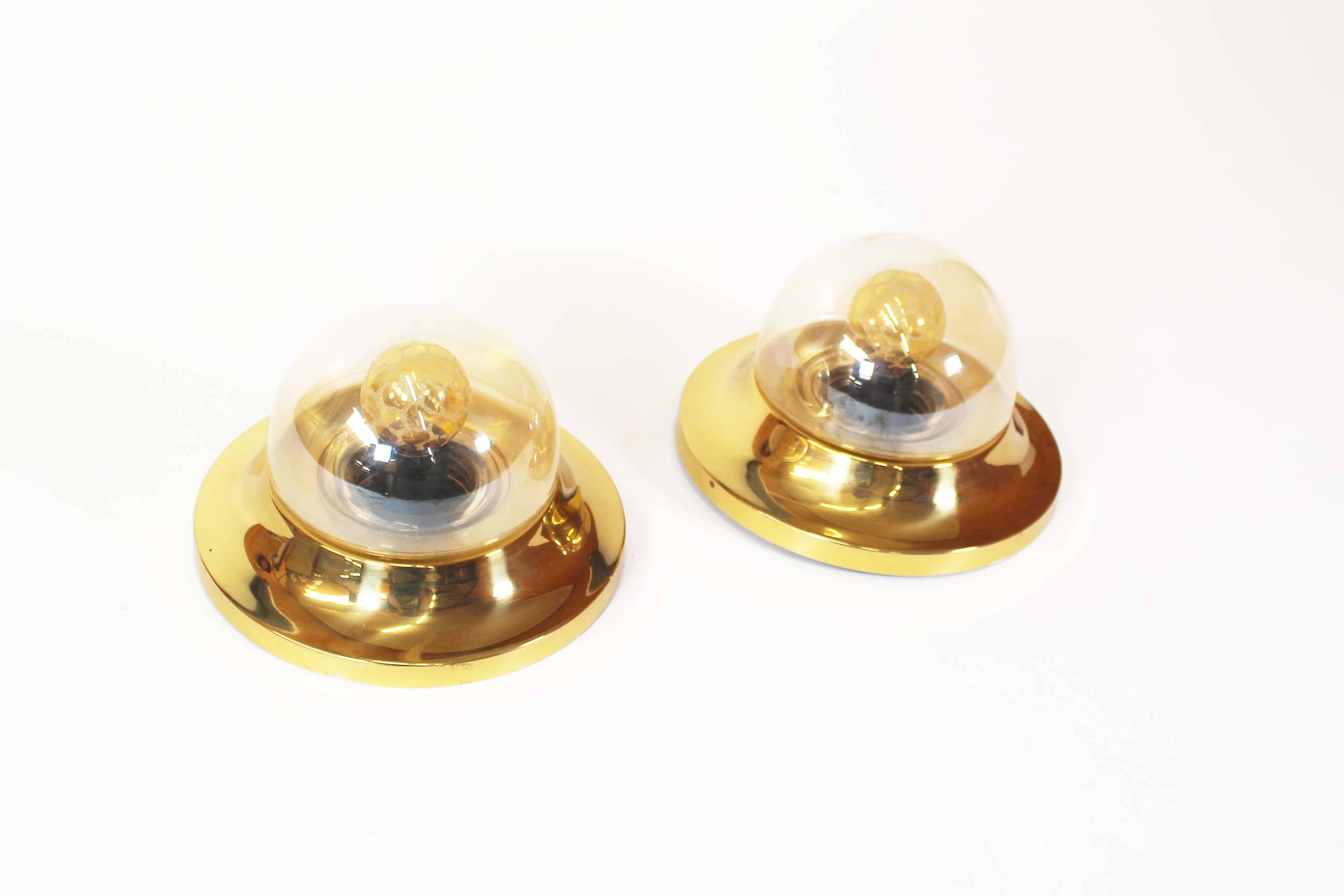 Pair of 1970’s petite brass & glass wall lights