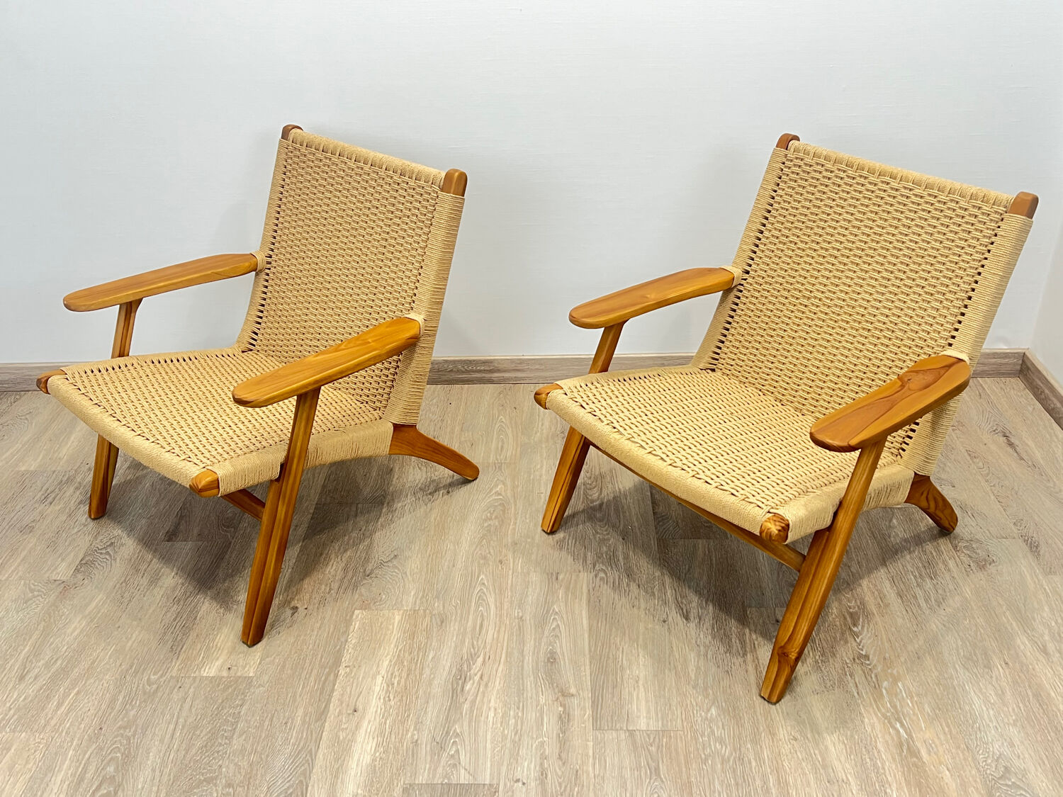 Pair of Scandinavian armchairs in woven solid teak.