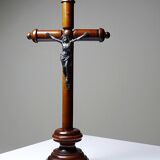 Antique wooden altar crucifix with a turned design and silver-plated Christ.