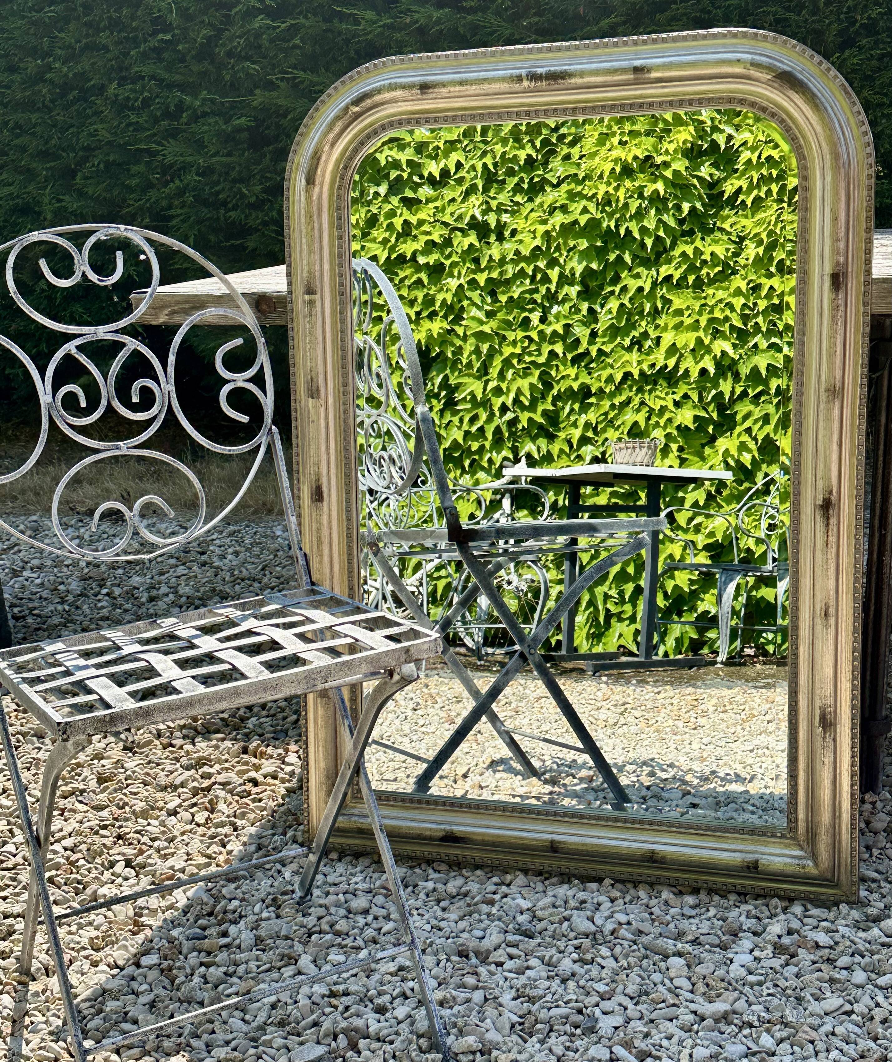 Louis Philippe style mirror in wood and gilded stuck 105,5x75cm