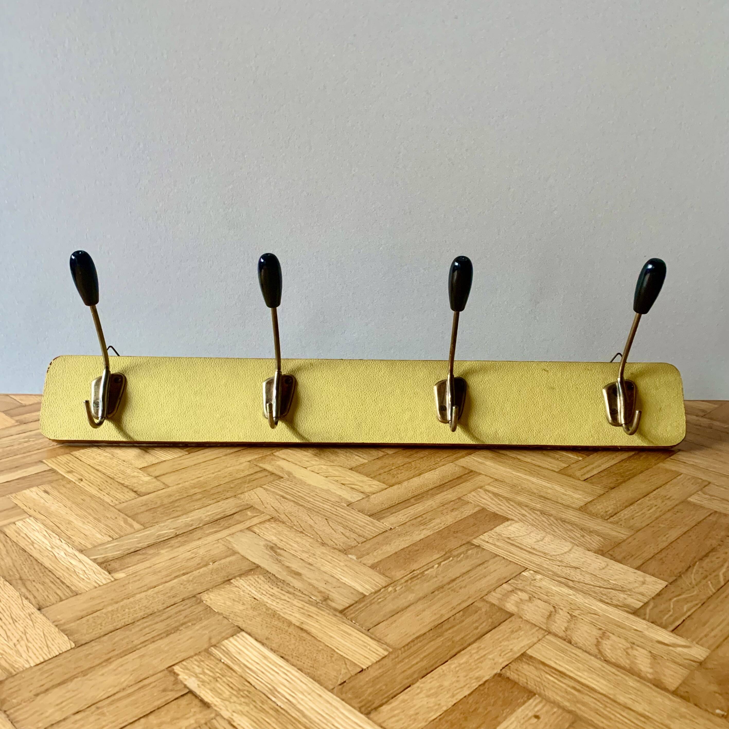 Vintage yellow wall coat rack - four hooks - 1950s