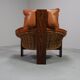 Vintage tripod lounge chair in leather, rattan and oak, Netherlands