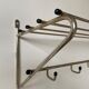 Metal wall coat holder with tablet