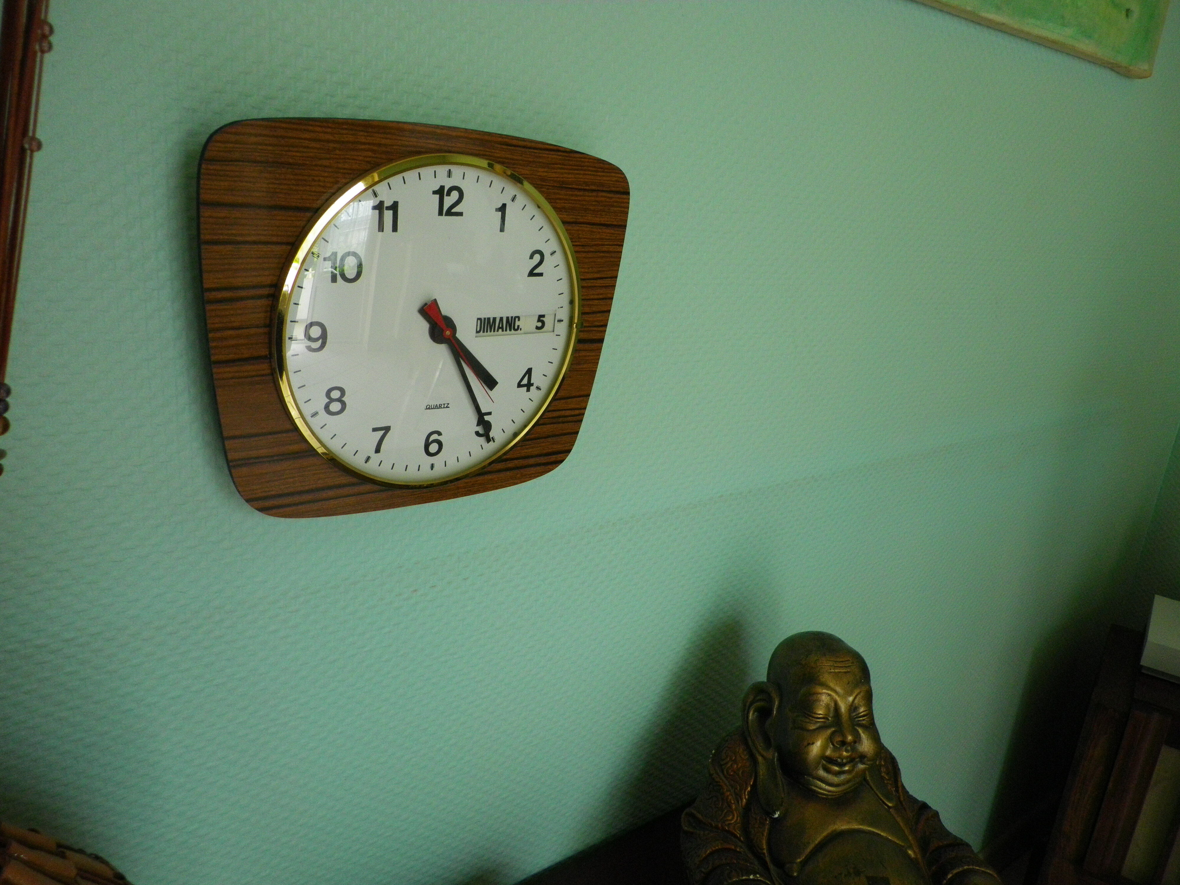 Formica wall clock with day and date - 1970s