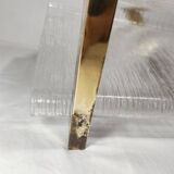 Revistero de metacrilato y latón. España, 1980s.