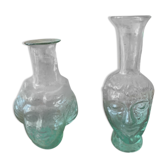 Glass vases in the shape of heads