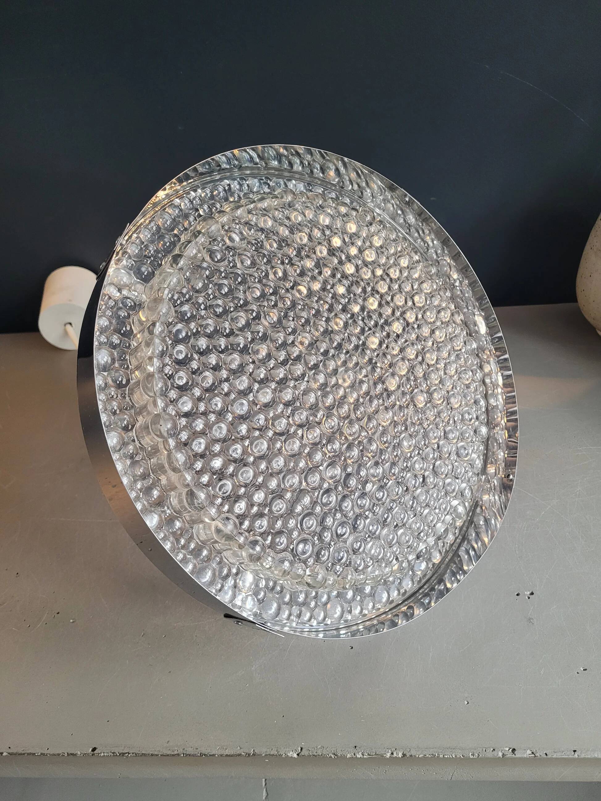 Suspension space-age in plastic bubble and aluminium