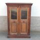 Small glass cabinet in old wood