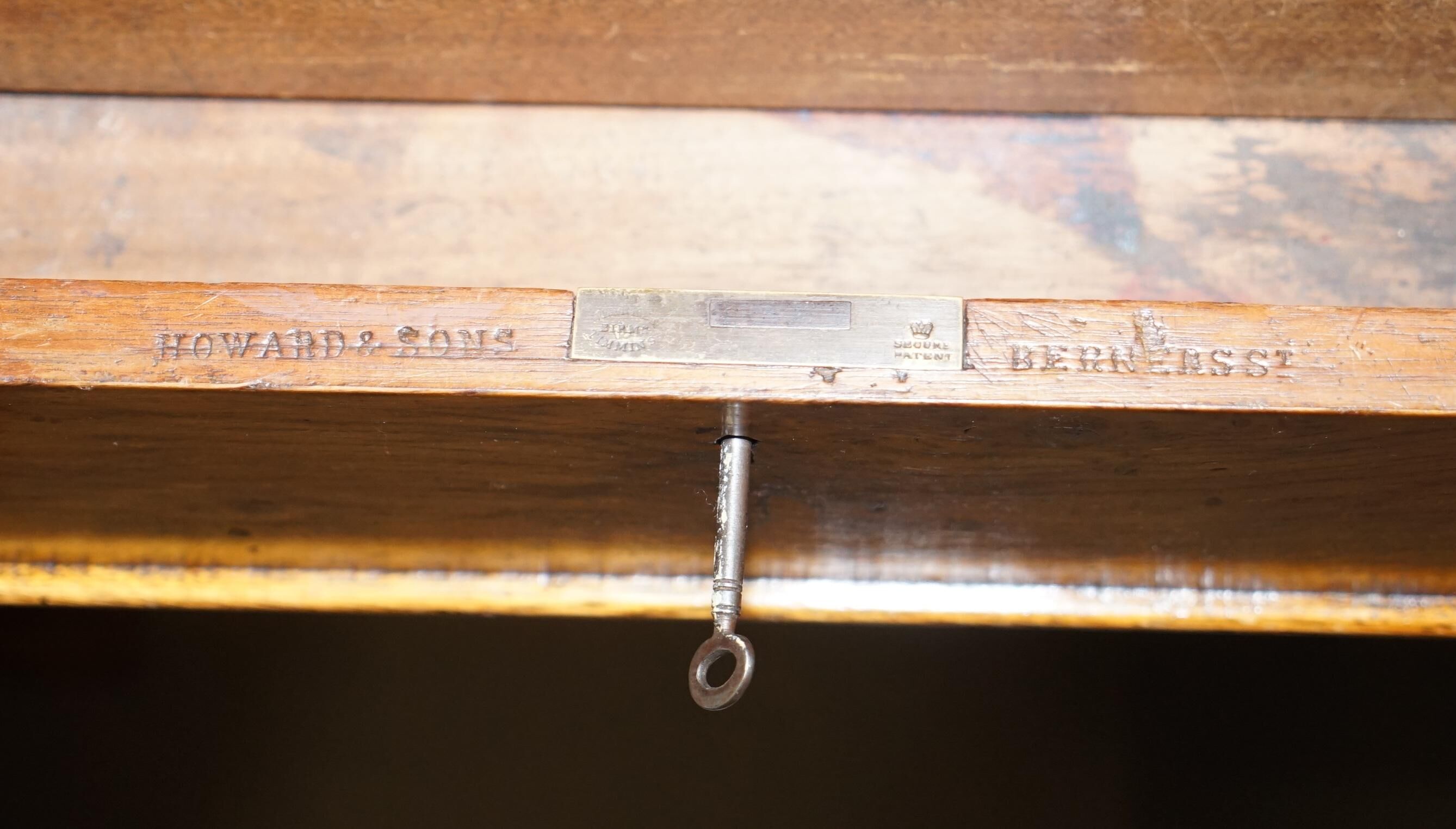 Rare oak partner's desk by Howard & Sons circa 1880 with leather.