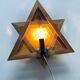 Luminous wooden wall star