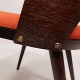 Scandinavian design orange papaya shell dining chairs
