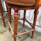 Pair of bar stools turning bar rests brass feet Hollywood Regency