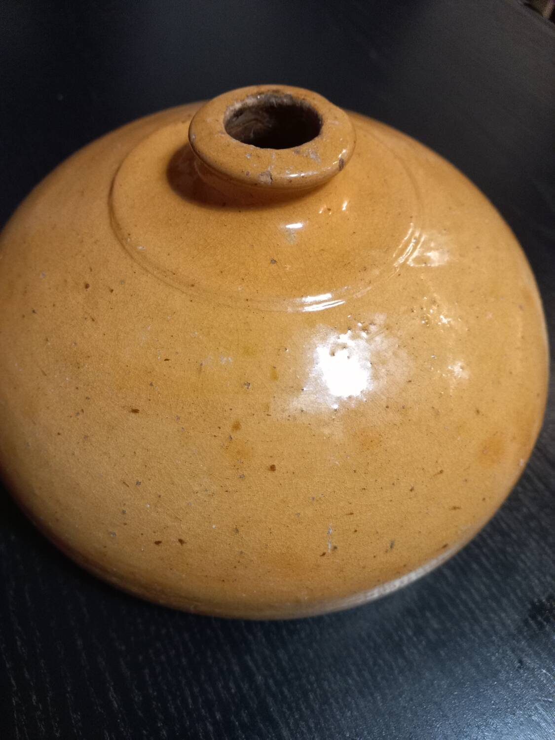 Old enameled terracotta hot water bottle
