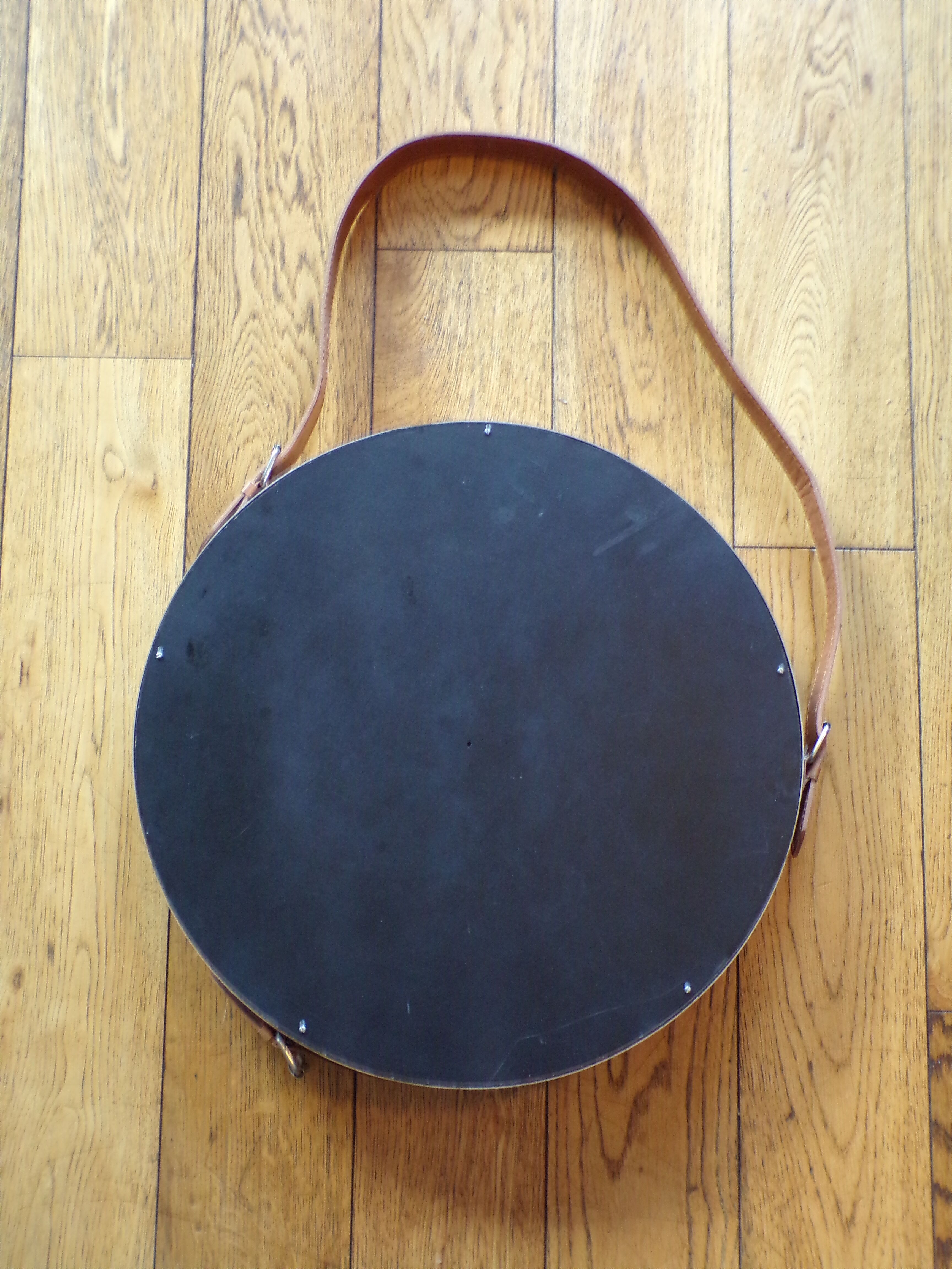 Vintage mirror with leather