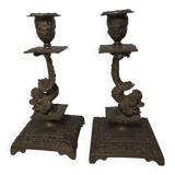 Pair of candlesticks with bronze dolphins